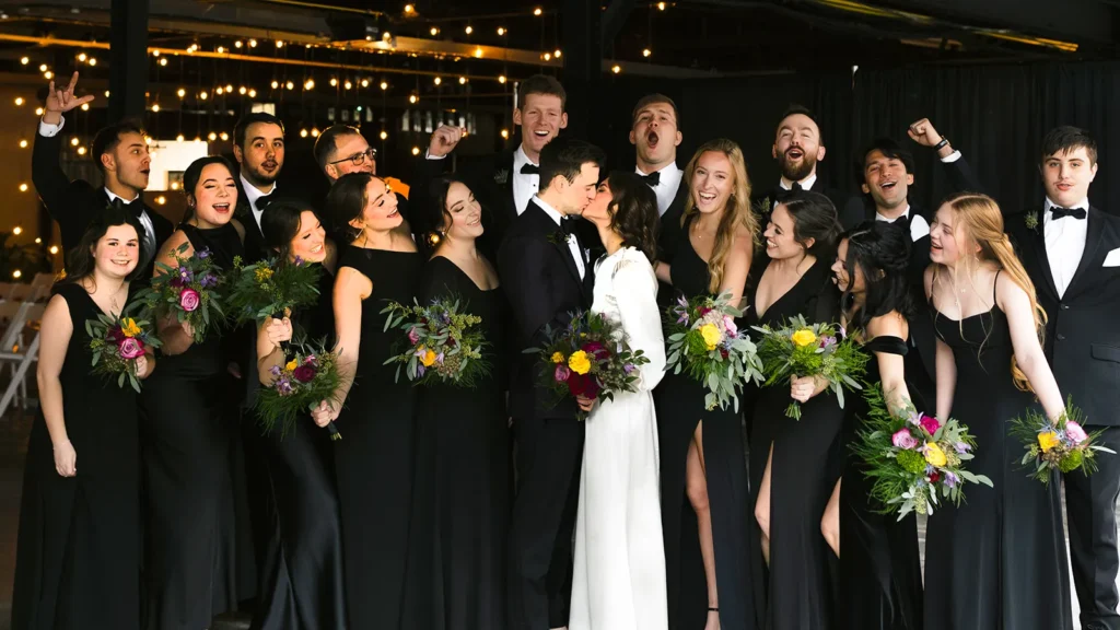 Bride and Groom Kiss in the Tool and Die Shop at Brass 16823