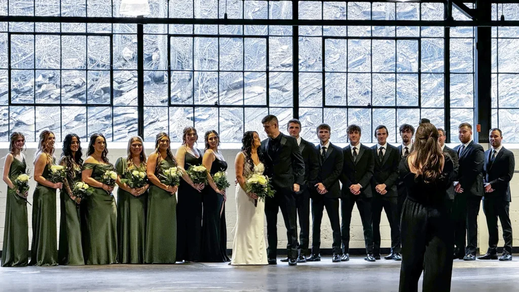Wedding Party Photography Against Giant Windows